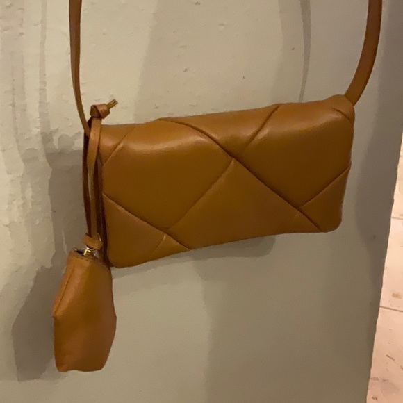 Like new Vince Camuto light cognac crossbody with pouch